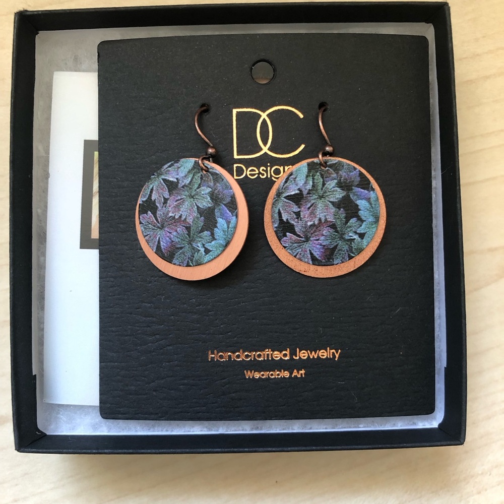 Brand new in box never worn DC designs earrings